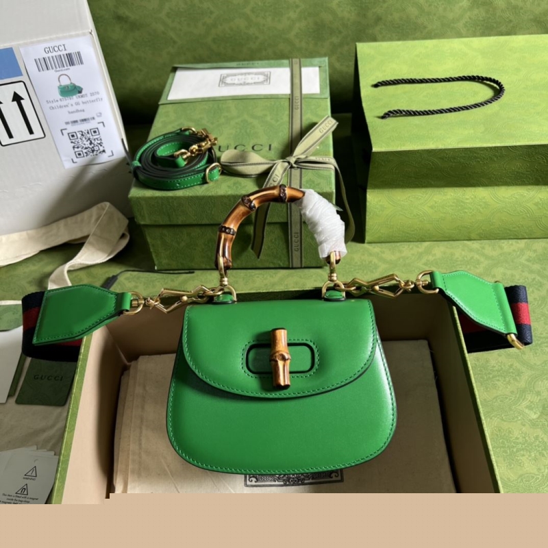 G*u*i top handle bags